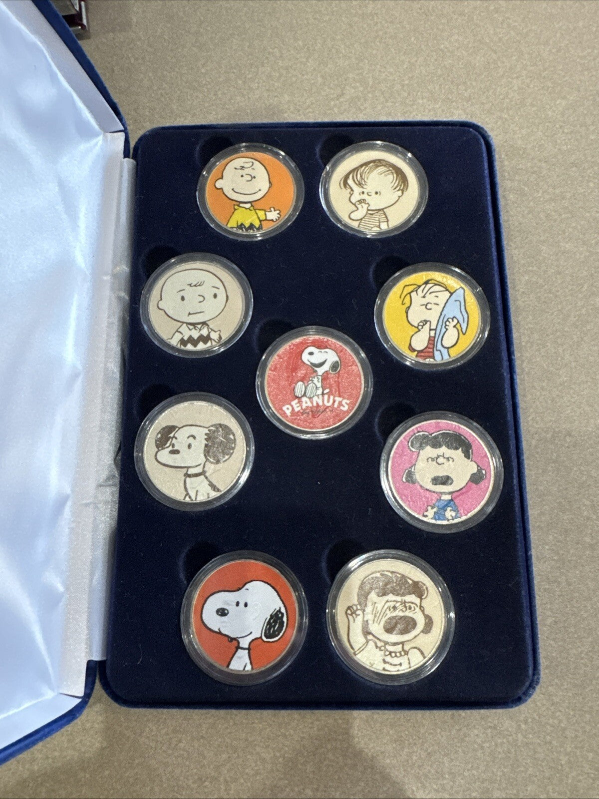 2011 NINE COIN PEANUTS MERRIK COLORIZED COIN COLLECTION WITH COA