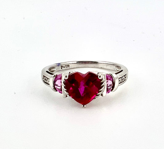 14k white gold ring with ruby heart design