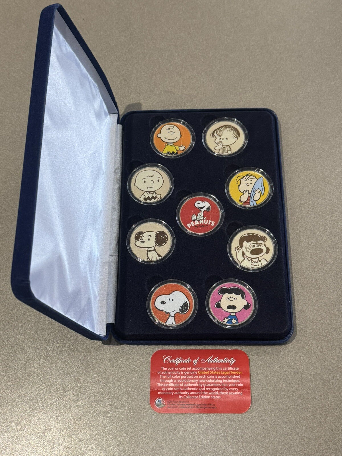 2011 NINE COIN PEANUTS MERRIK COLORIZED COIN COLLECTION WITH COA