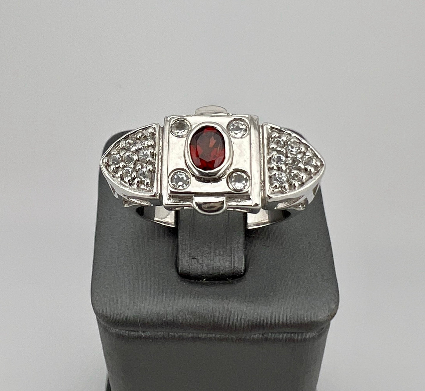 Sterling silver ring with CZ and red stone