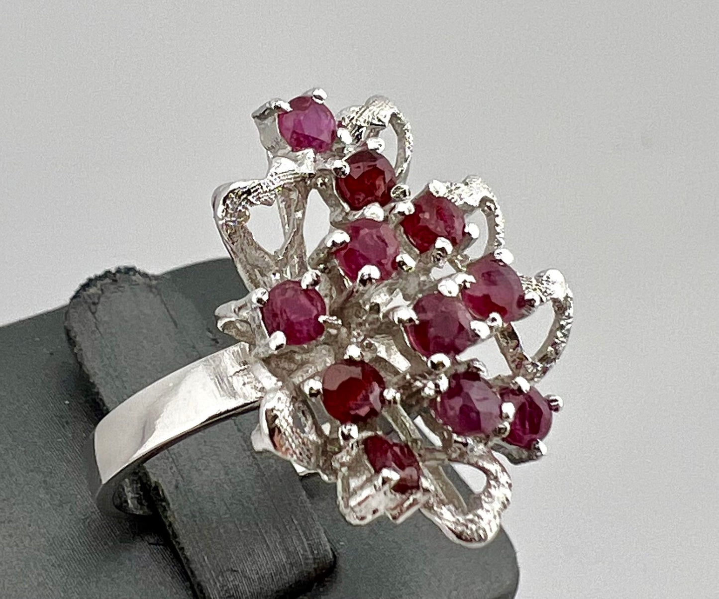 Ladies sterling silver ring with Ruby and heart-shaped design