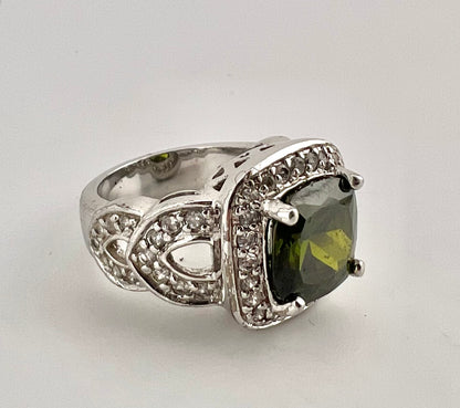 Ladies green gemstone halo, fancy sterling ring