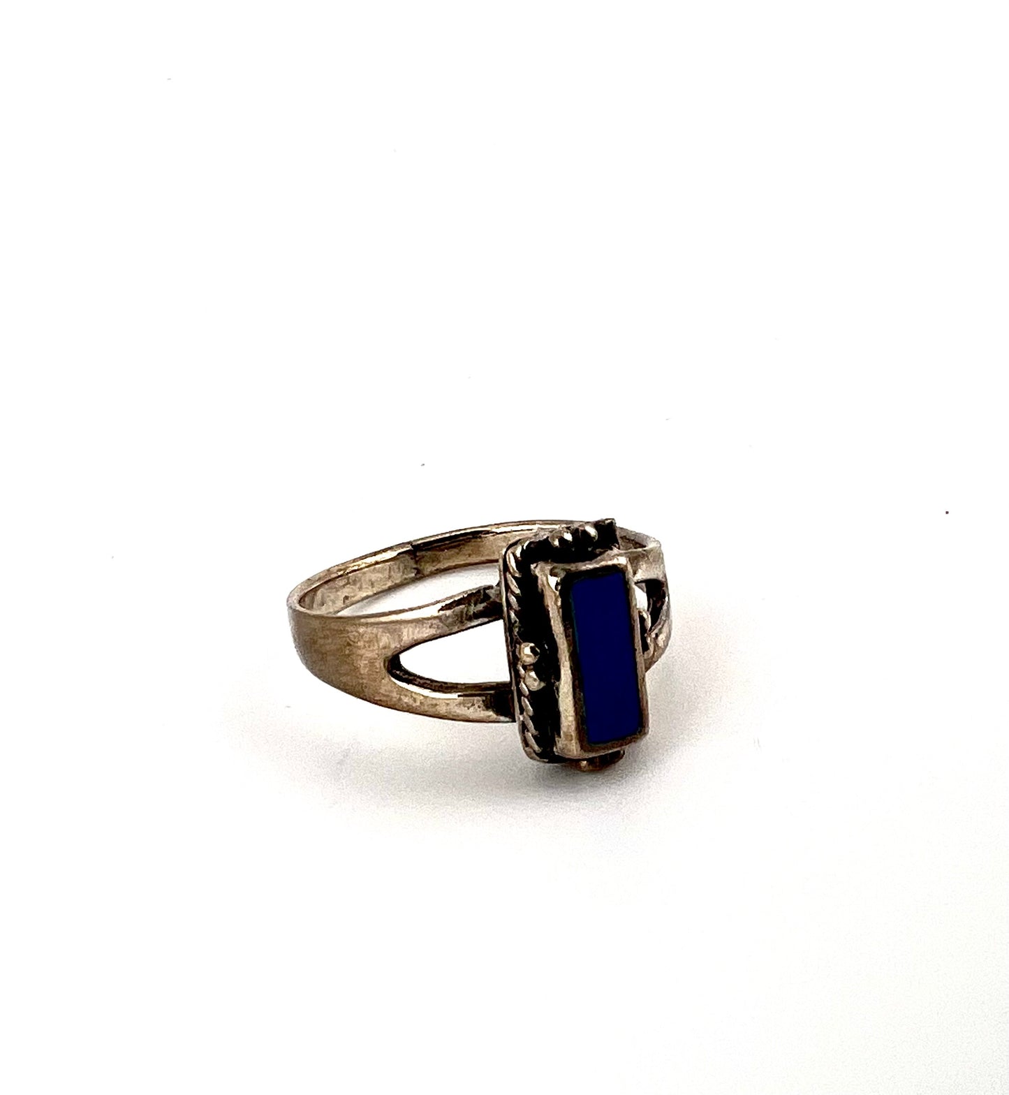 Sterling silver ring with small blue main stone