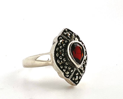 Ladies pear-shaped red stone ring sterling silver.