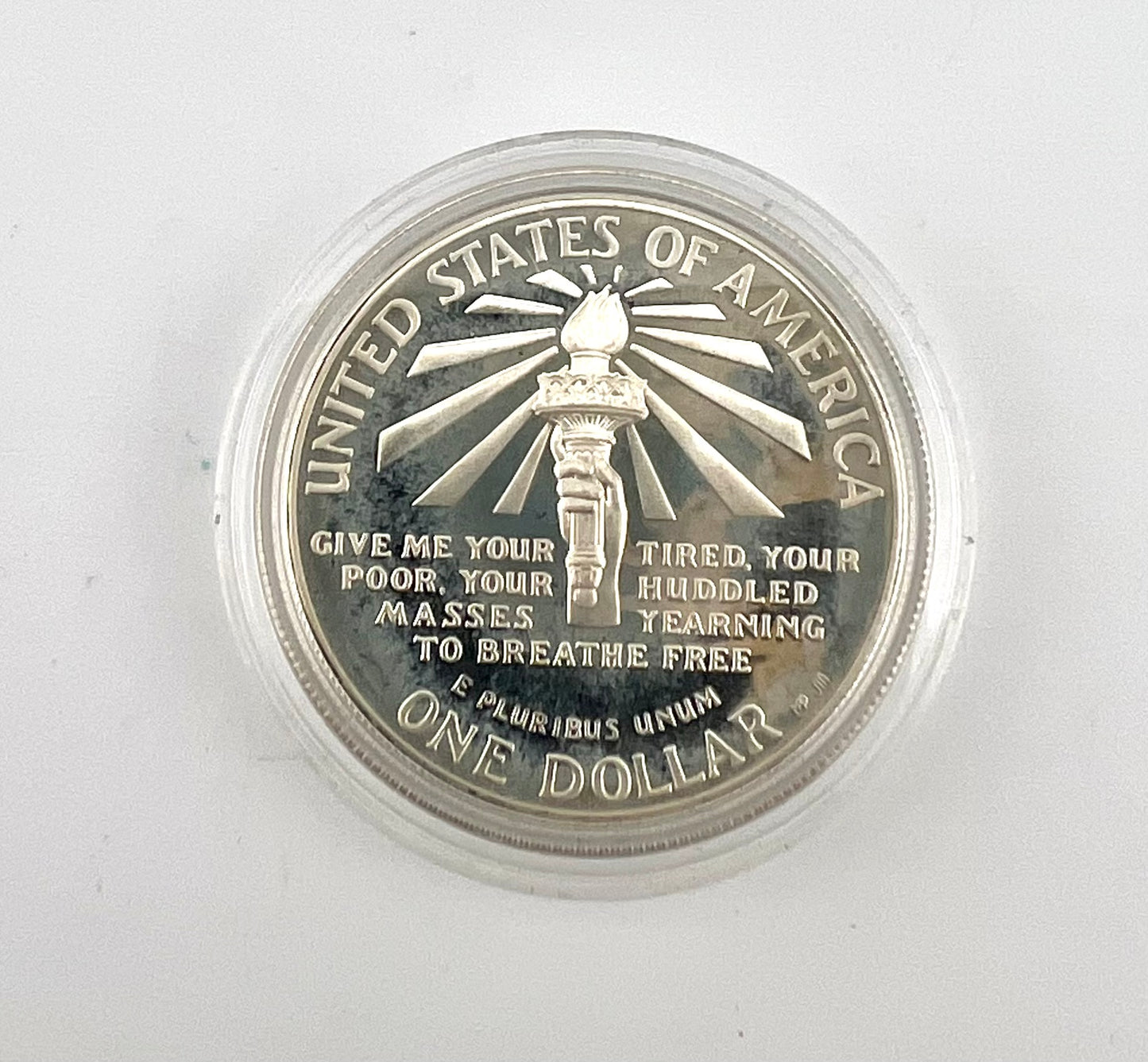 1986-S Proof Ellis Island Statue of Liberty Commemorative Silver Dollar $1 with patina