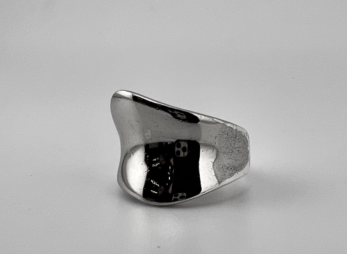 Ladies silver ring with concave wave design