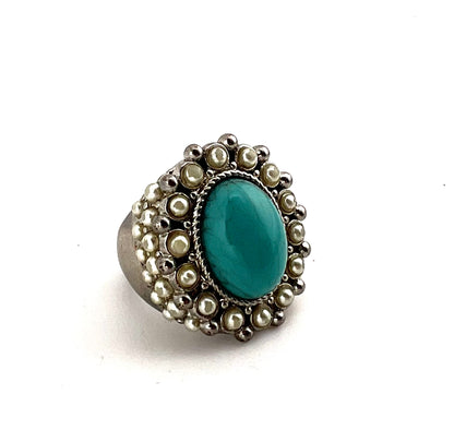 Sterling silver ring with turquoise main stone