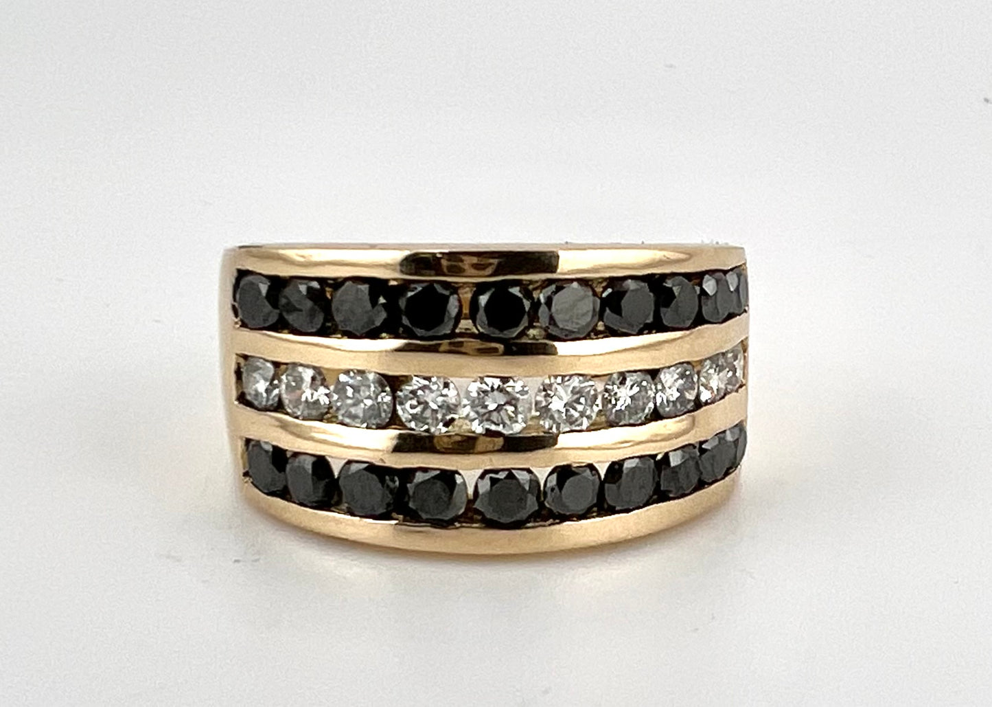 18K yellow gold three row channel set white and black diamond wedding band