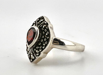 Ladies pear-shaped red stone ring sterling silver.