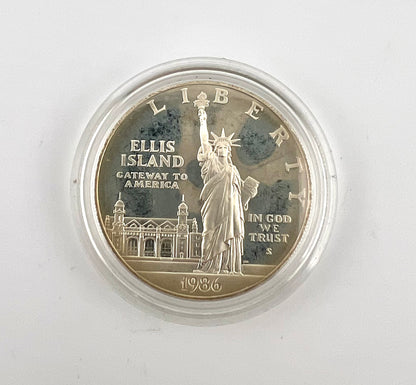 1986-S Proof Ellis Island Statue of Liberty Commemorative Silver Dollar $1 with patina