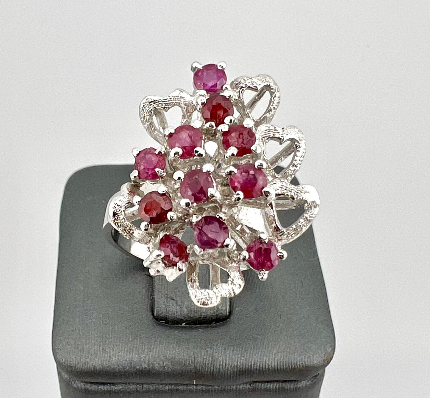 Ladies sterling silver ring with Ruby and heart-shaped design