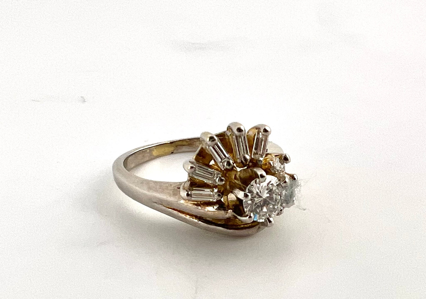 10k white gold ladies ring with round and baguette diamonds