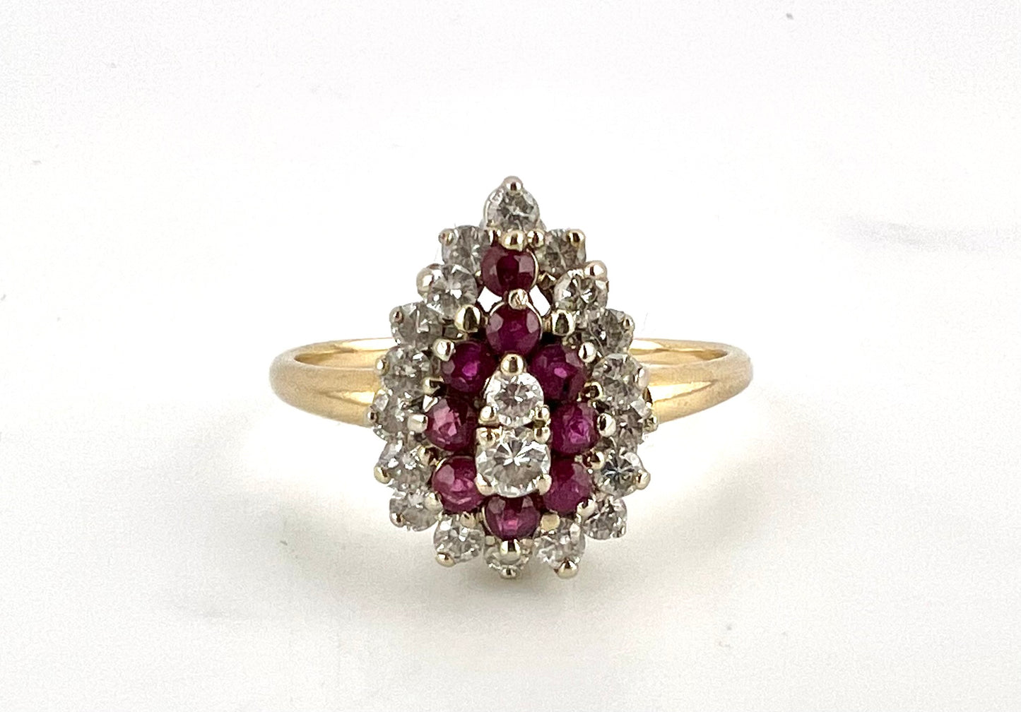 14K yellow gold ladies, pear-shaped, diamond, and ruby cluster ring