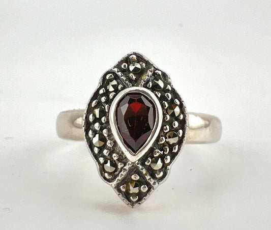 Ladies pear-shaped red stone ring sterling silver.