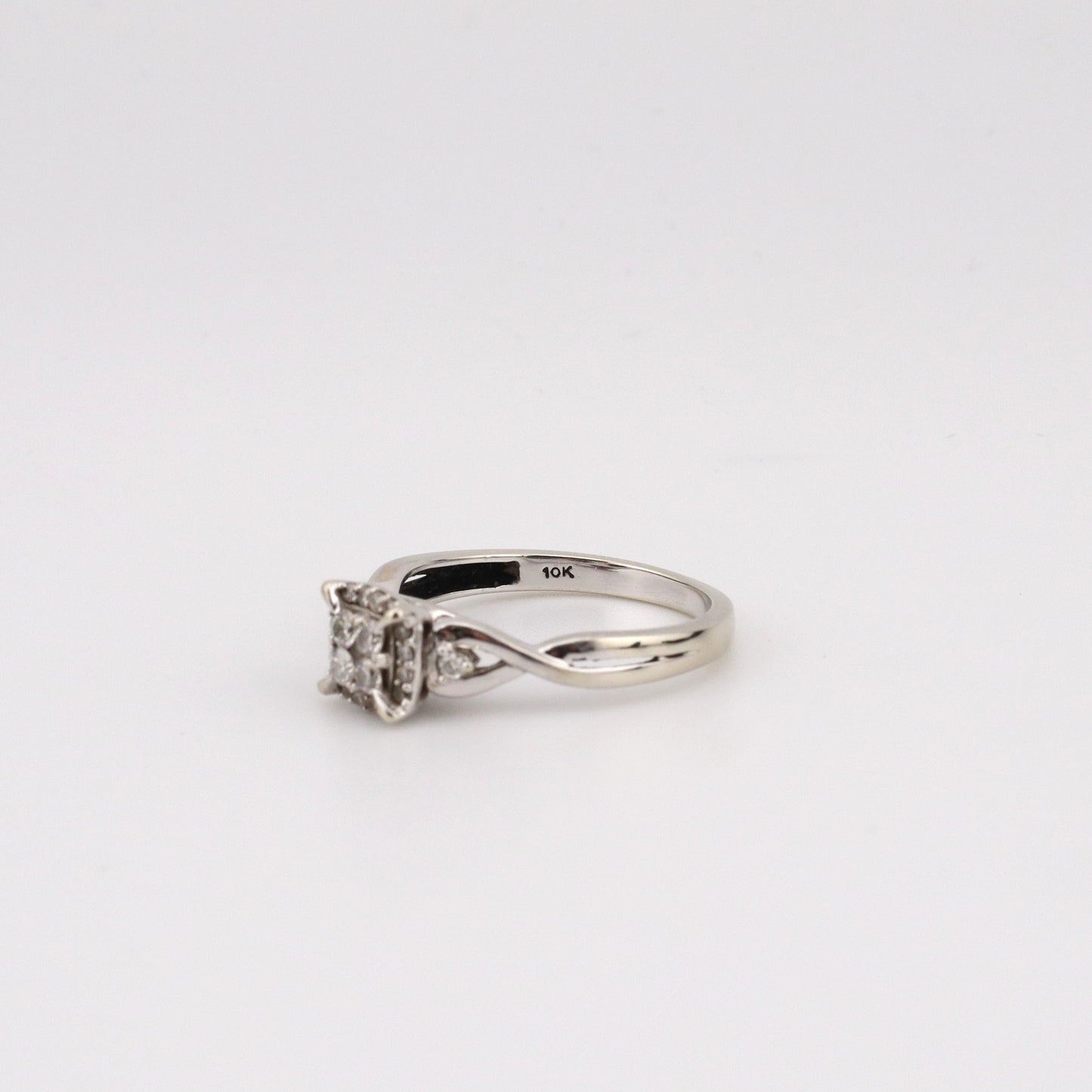 10K white gold single halo diamond ring