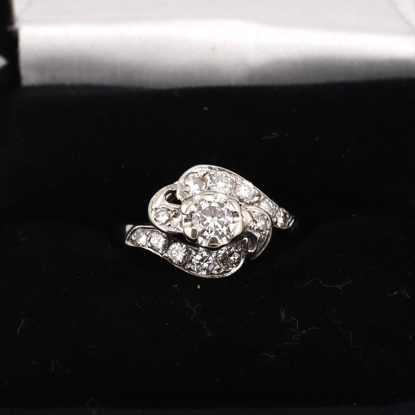 14k white gold swirl design ladies diamond ring