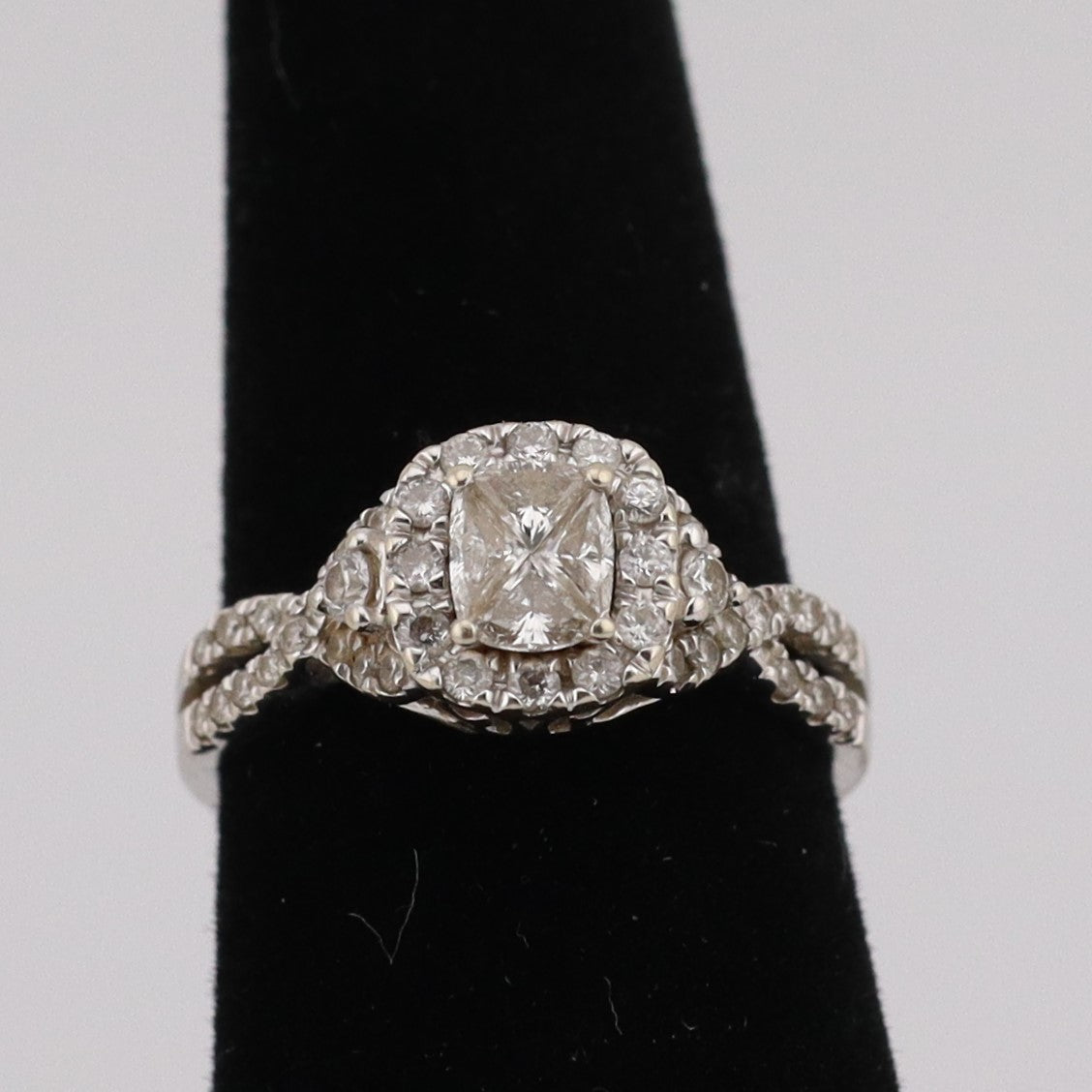 14k Ladies trillion cut center diamonds halo ring